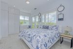 1st level Master Suite- ample closet space  and coastal decor